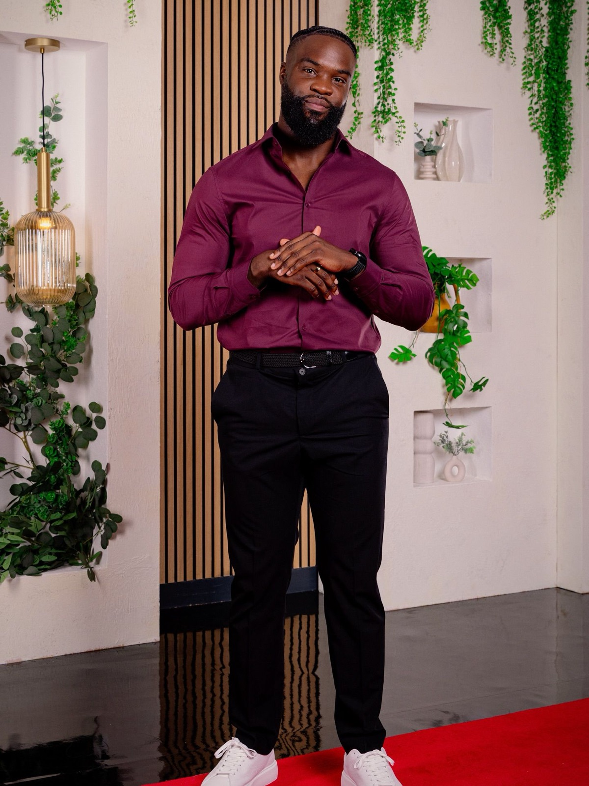 Javen Palmer in a burgundy shirt